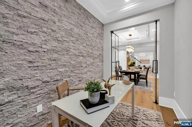 a view of a walk in closet and natural light