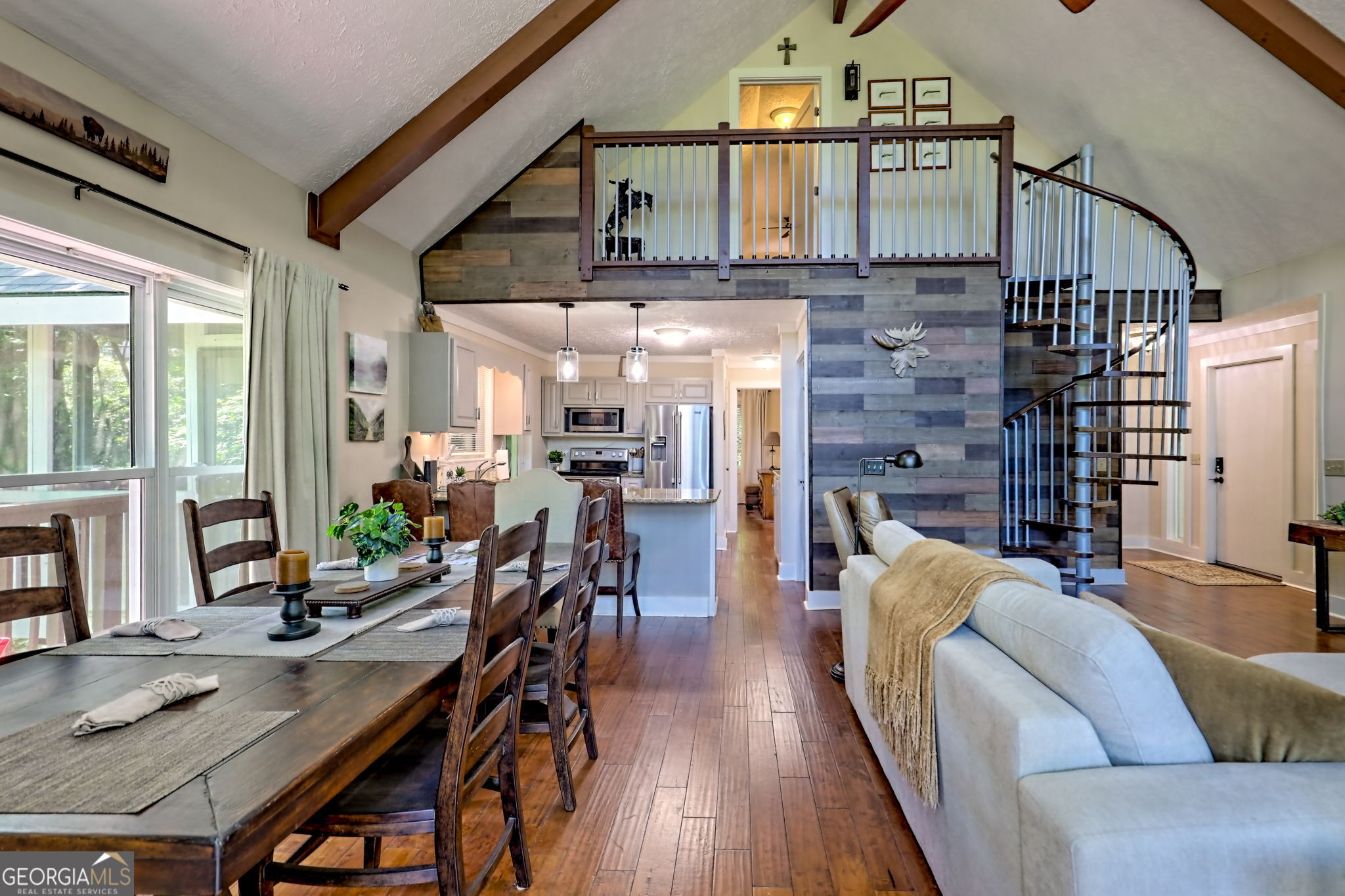 850 Ridgepole Drive Sky Valley, GA 30537 - Photo 18 of 73 a living room with fireplace furniture and a wooden floor