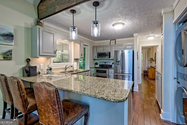 a view of a two chairs in the deck