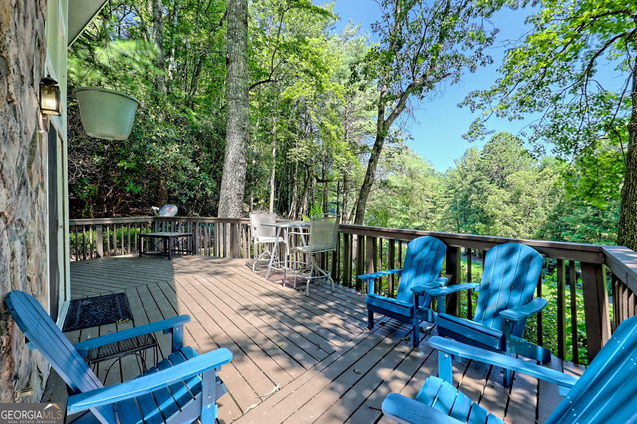 850 Ridgepole Drive Sky Valley, GA 30537 - Photo 24 of 73 a view of a deck with wooden floor and outdoor seating