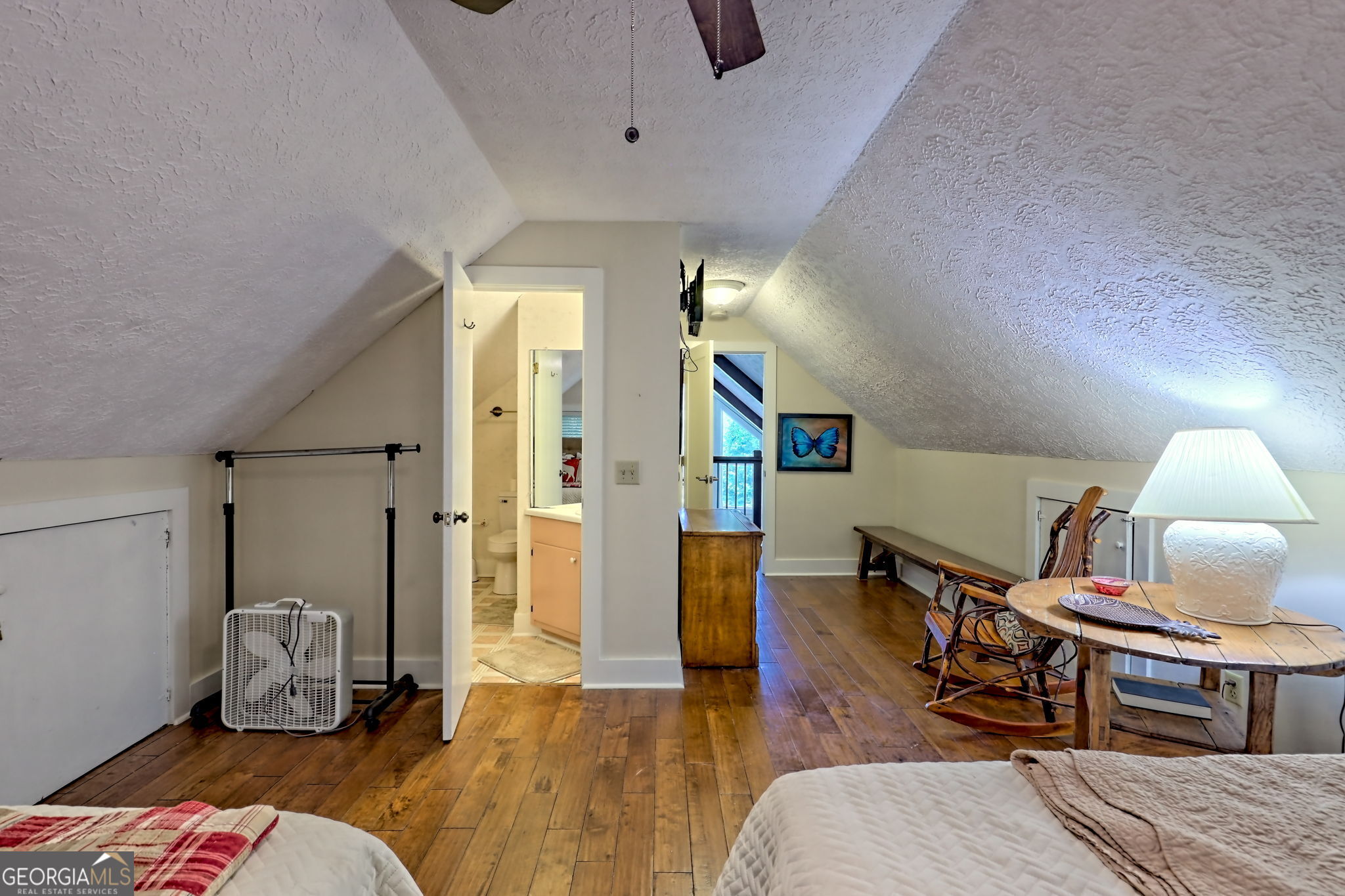 850 Ridgepole Drive Sky Valley, GA 30537 - Photo 46 of 73 a living room with furniture and a wooden floor