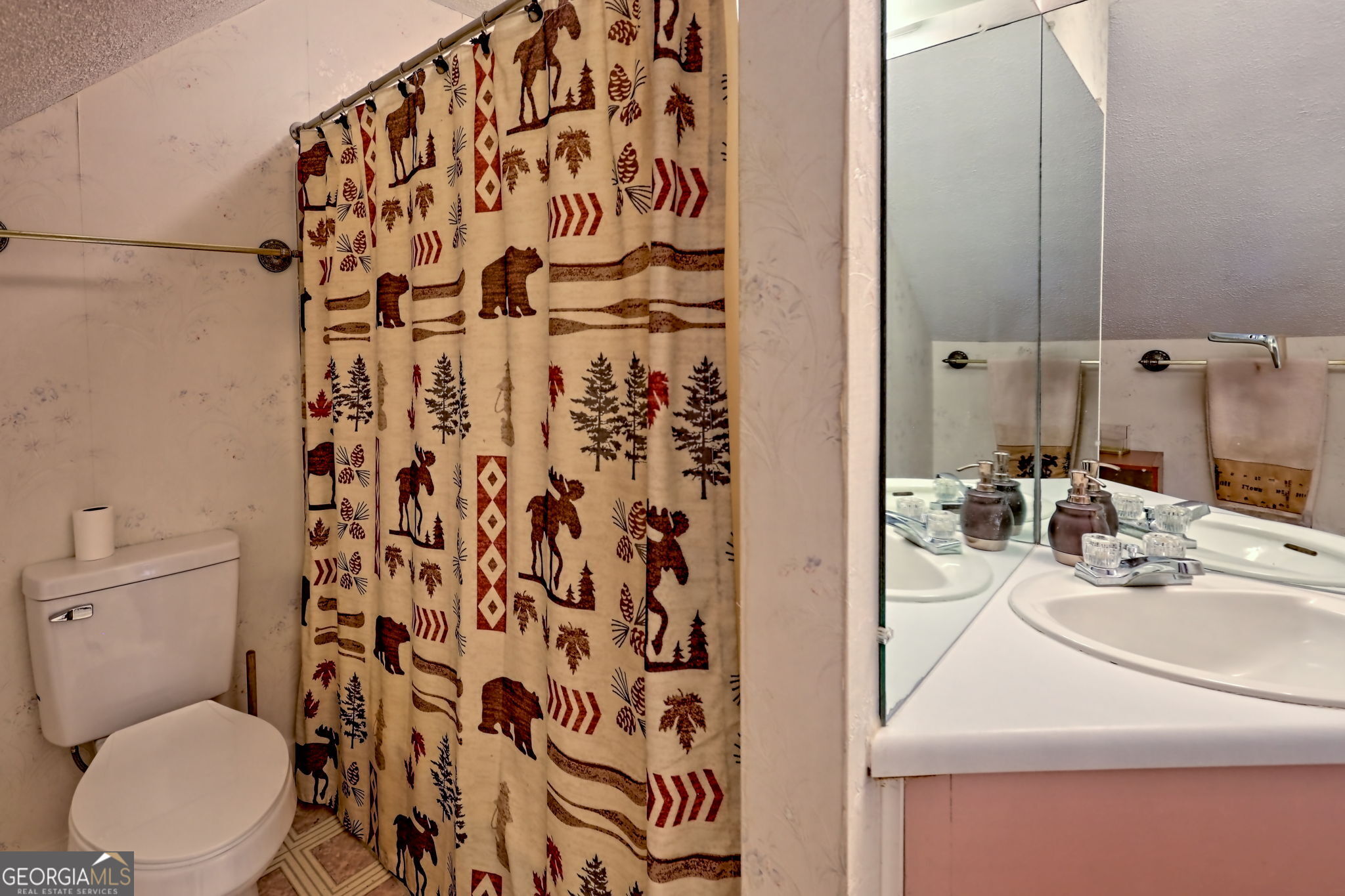 850 Ridgepole Drive Sky Valley, GA 30537 - Photo 47 of 73 a bathroom with a sink toilet and shower