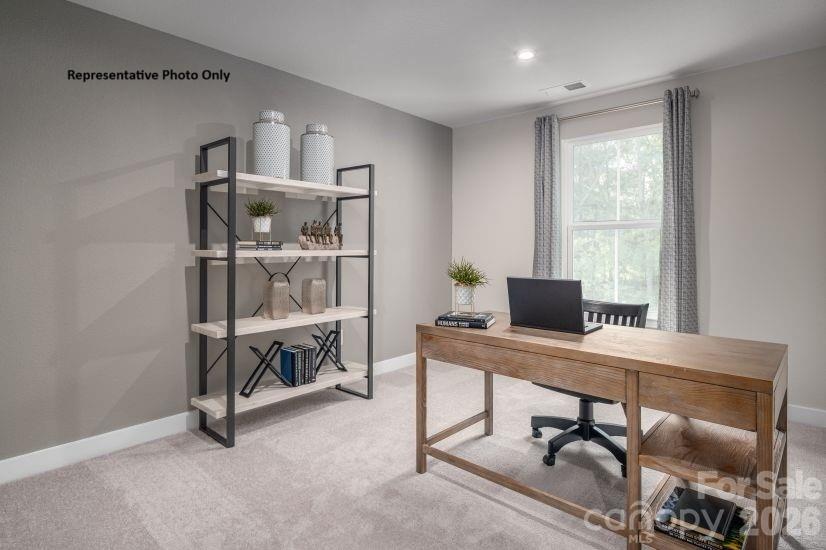 2308 Flicker Road, Unit 1046A Indian Land, SC 29707 - Photo 10 of 15 a view of a workspace with furniture and a window