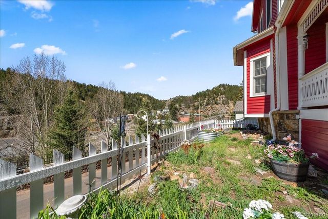 a view of a chairs in front of house