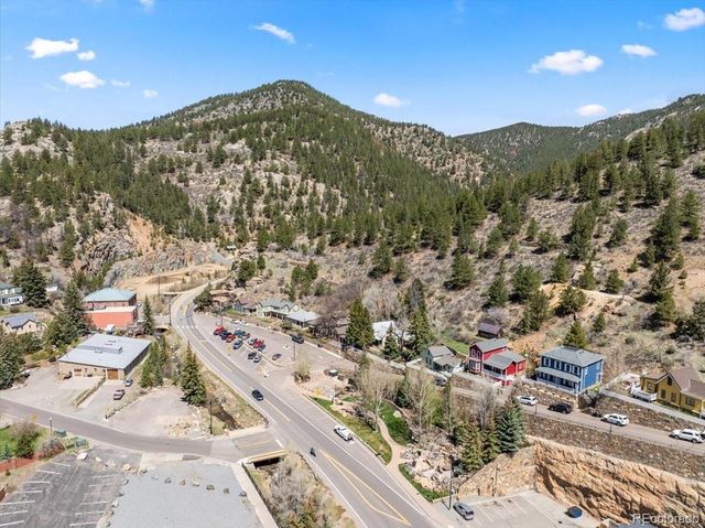 a view of a house with a mountain