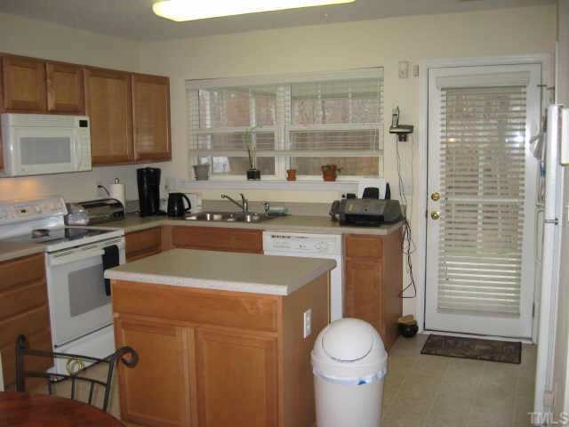 3925 Hopper Street Raleigh, NC 27616 - Photo 4 of 12 kitchen with island