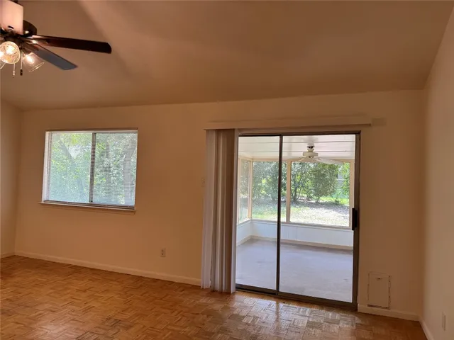 a view of a room with a large window