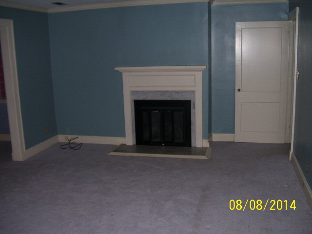 491 Pinecrest Road Macon, GA 31204 - Photo 12 of 12 a view of an empty room with a fireplace