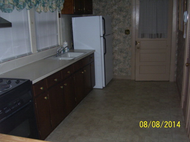 491 Pinecrest Road Macon, GA 31204 - Photo 9 of 12 a bathroom with a granite countertop sink a mirror and shower