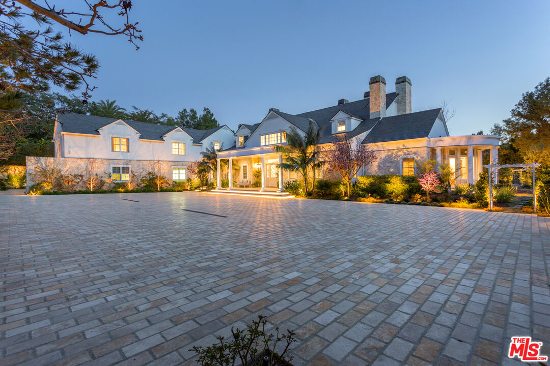 an outdoor space with lots of trees in the background