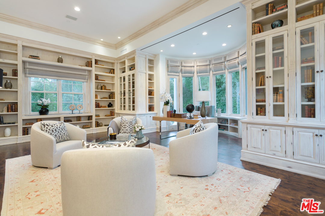 65 Beverly Park Beverly Hills, CA 90210 - Photo 11 of 51 a living room with furniture and windows