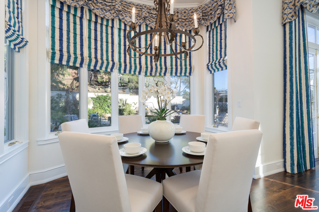 65 Beverly Park Beverly Hills, CA 90210 - Photo 18 of 51 a view of a dining room with furniture window and outside view