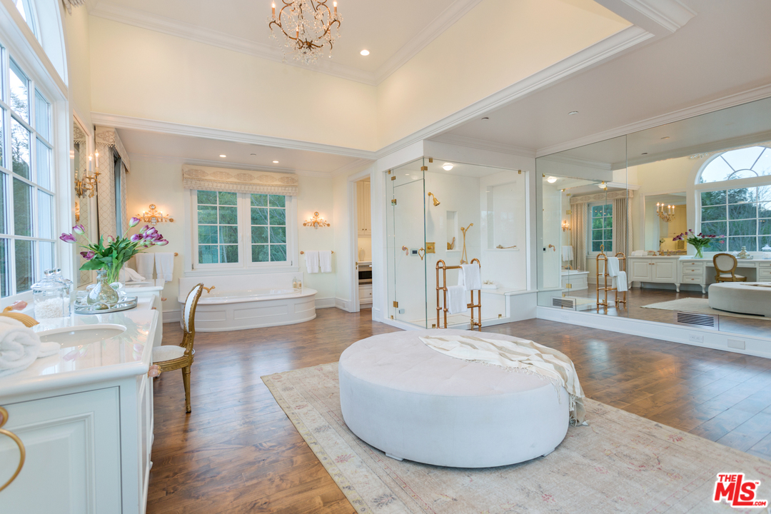 65 Beverly Park Beverly Hills, CA 90210 - Photo 26 of 51 a living room with furniture and a large window