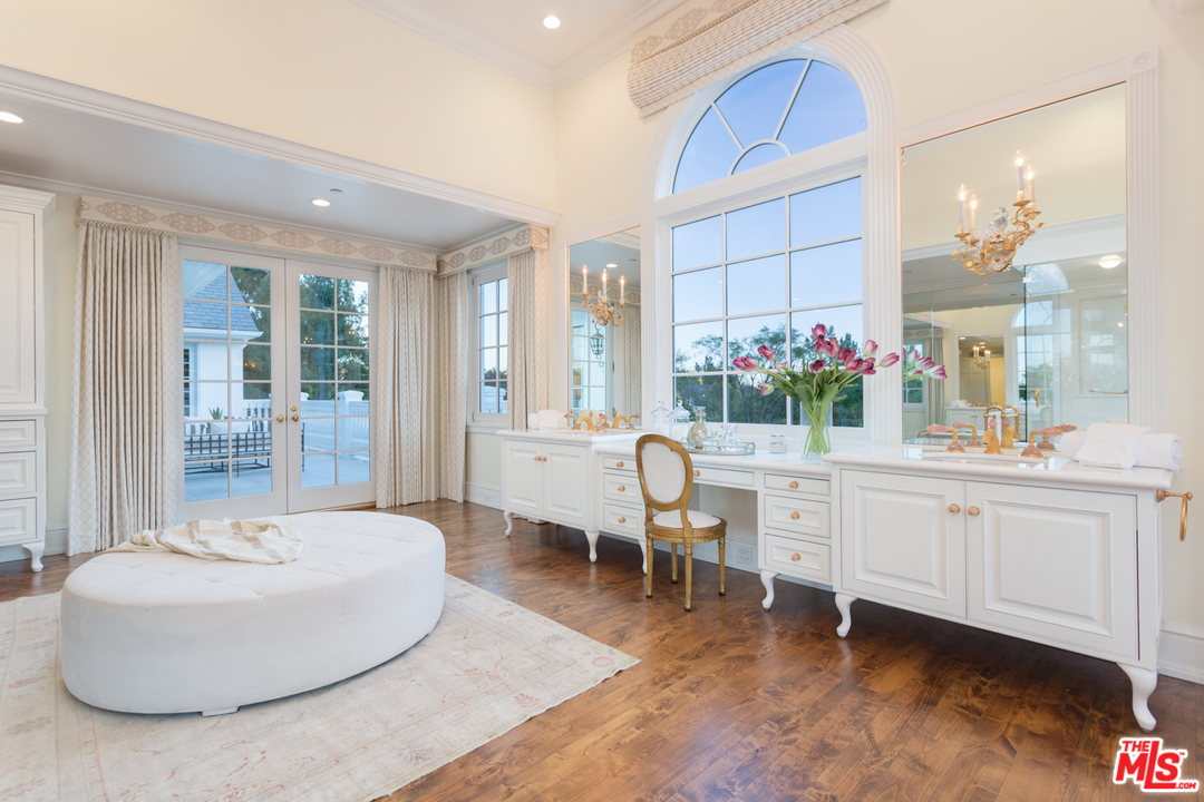 65 Beverly Park Beverly Hills, CA 90210 - Photo 27 of 51 a living room with furniture and a large window