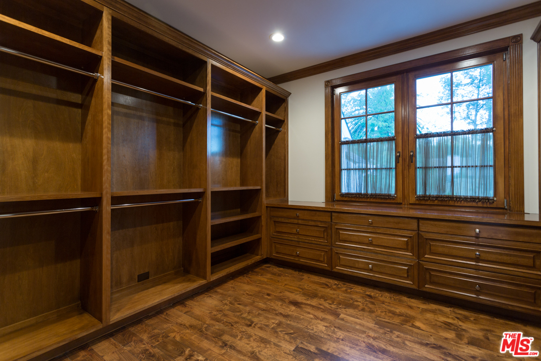 65 Beverly Park Beverly Hills, CA 90210 - Photo 33 of 51 a view of walk in closet