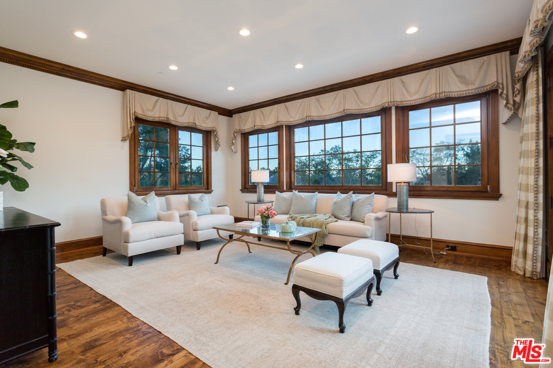 65 Beverly Park Beverly Hills, CA 90210 - Photo 38 of 51 a living room with furniture and a large window