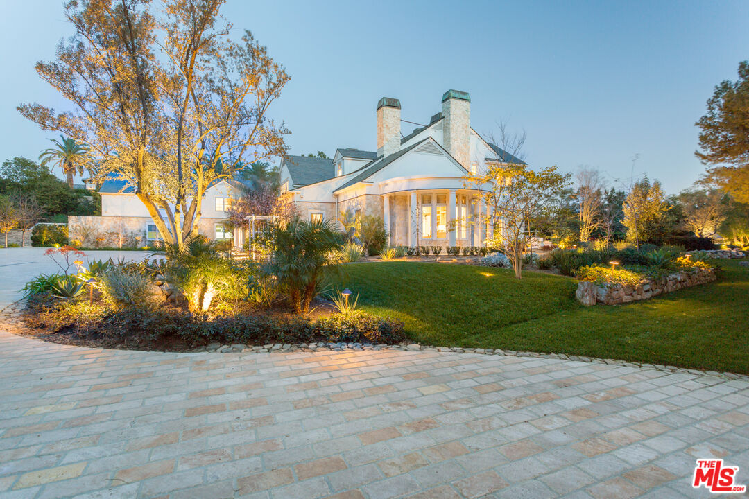65 Beverly Park Beverly Hills, CA 90210 - Photo 5 of 51 a view of a front of house with a yard