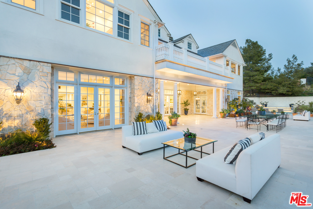 65 Beverly Park Beverly Hills, CA 90210 - Photo 46 of 51 a living room with furniture and a large window