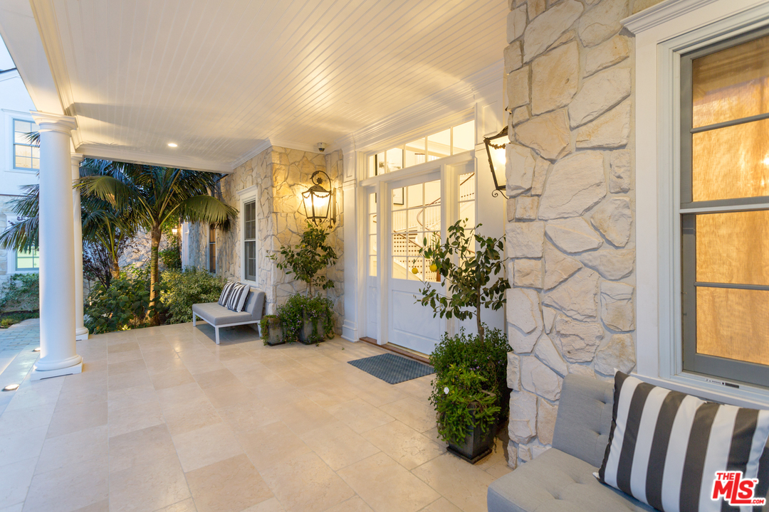 65 Beverly Park Beverly Hills, CA 90210 - Photo 7 of 51 a view of porch with seating space
