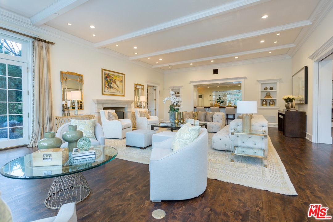 65 Beverly Park Beverly Hills, CA 90210 - Photo 9 of 51 a living room with furniture and a large window