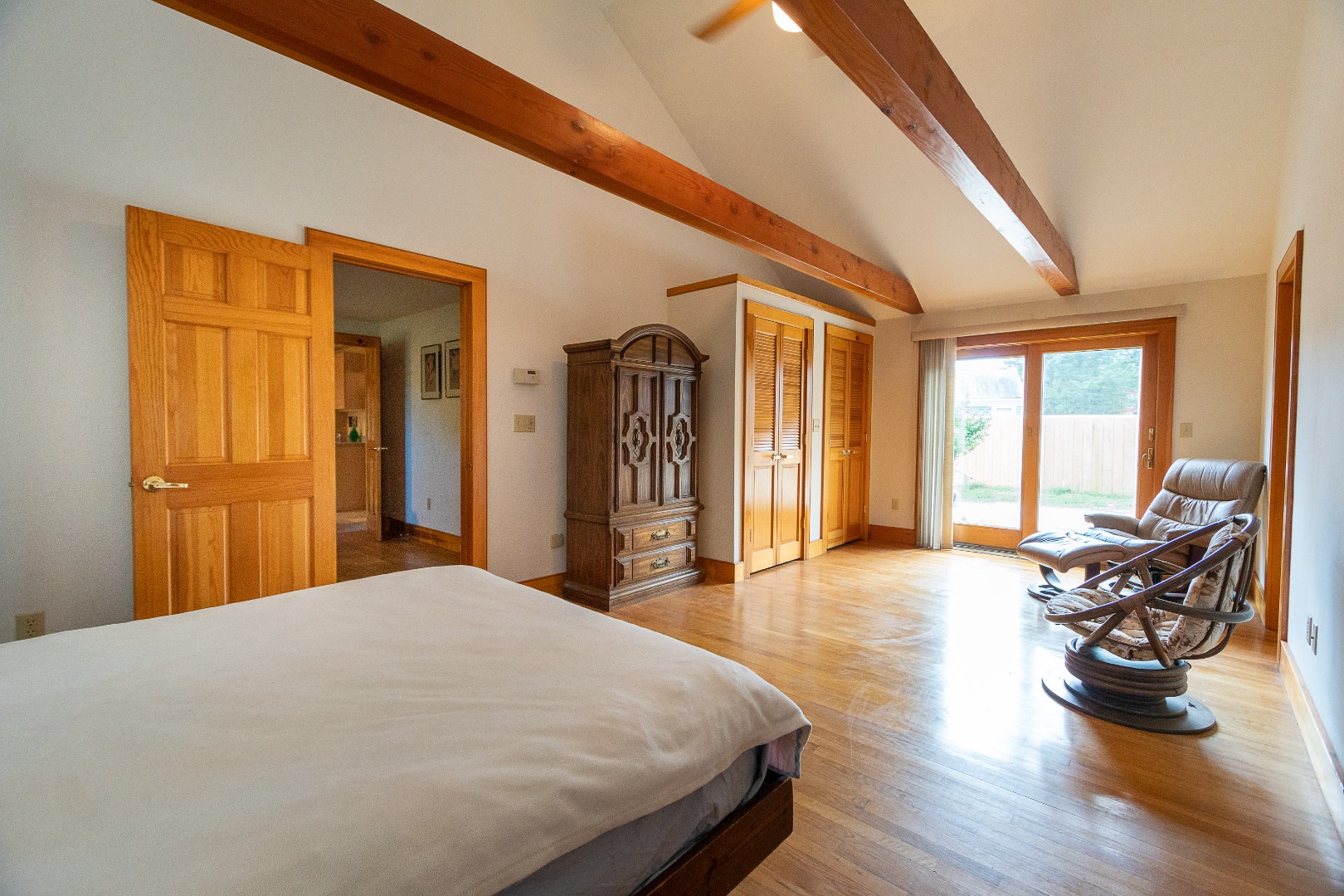 17 Bartlett Road Nantucket, MA 02554 - Photo 13 of 30 1st Floor Master Bedroom en-suite with French door to side deck