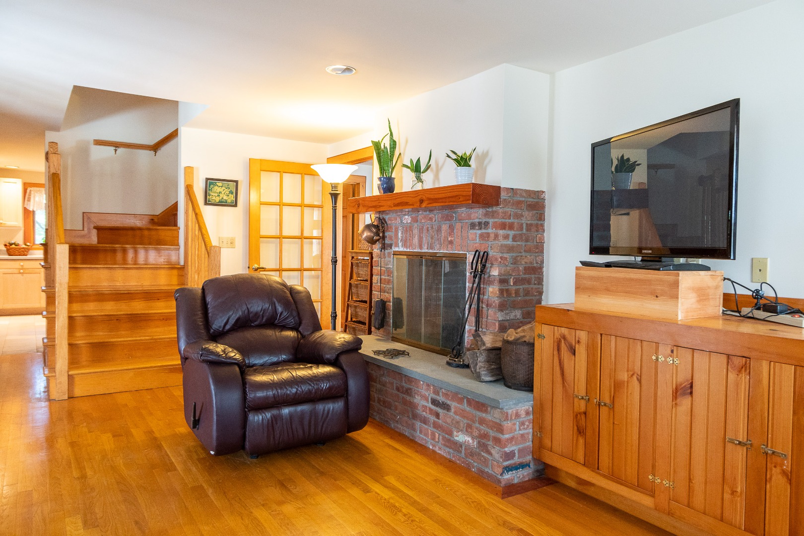 17 Bartlett Road Nantucket, MA 02554 - Photo 9 of 30 Den with Fireplace and Stove