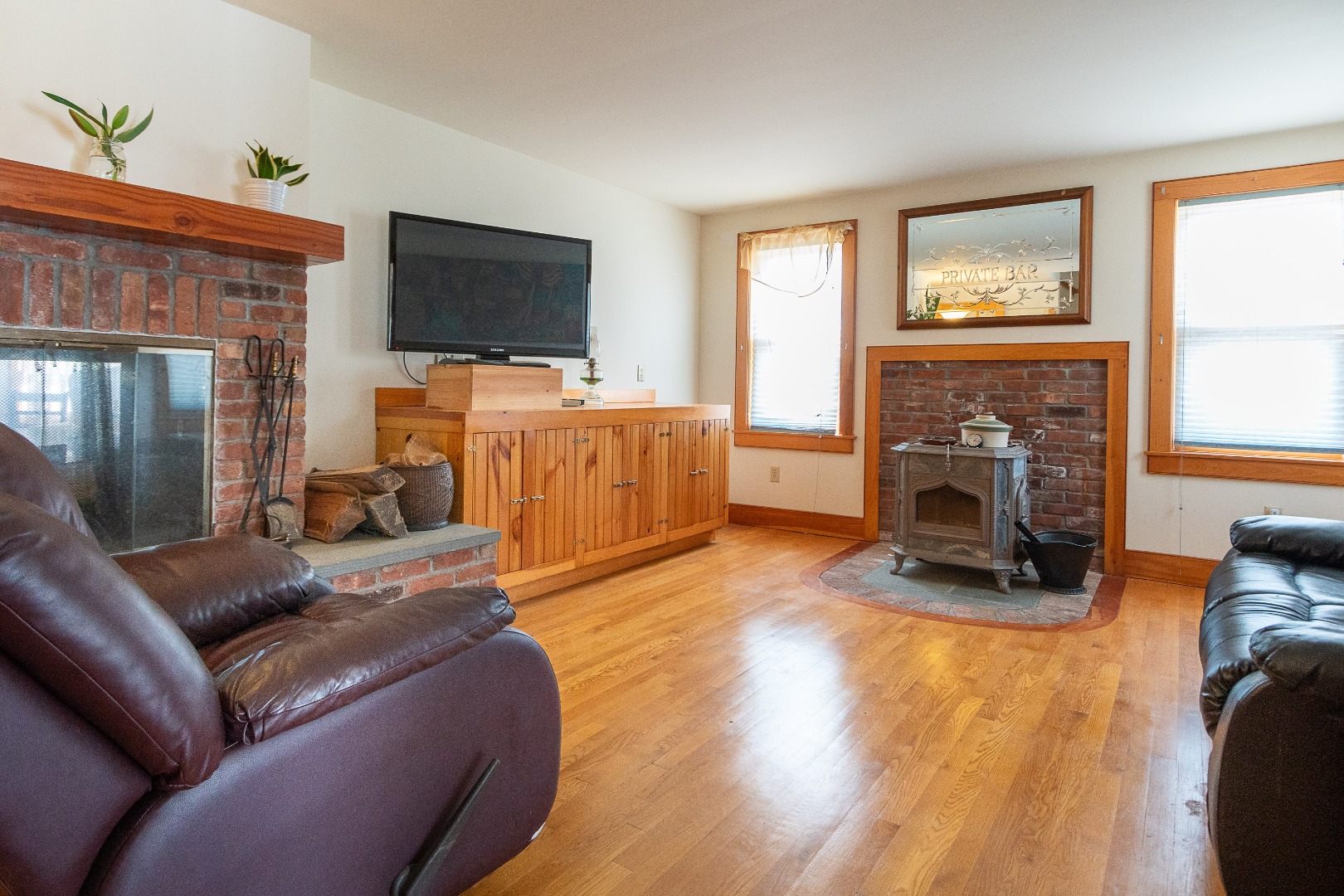 17 Bartlett Road Nantucket, MA 02554 - Photo 10 of 30 Den with Fireplace and Stove