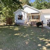 a view of a house with a big yard