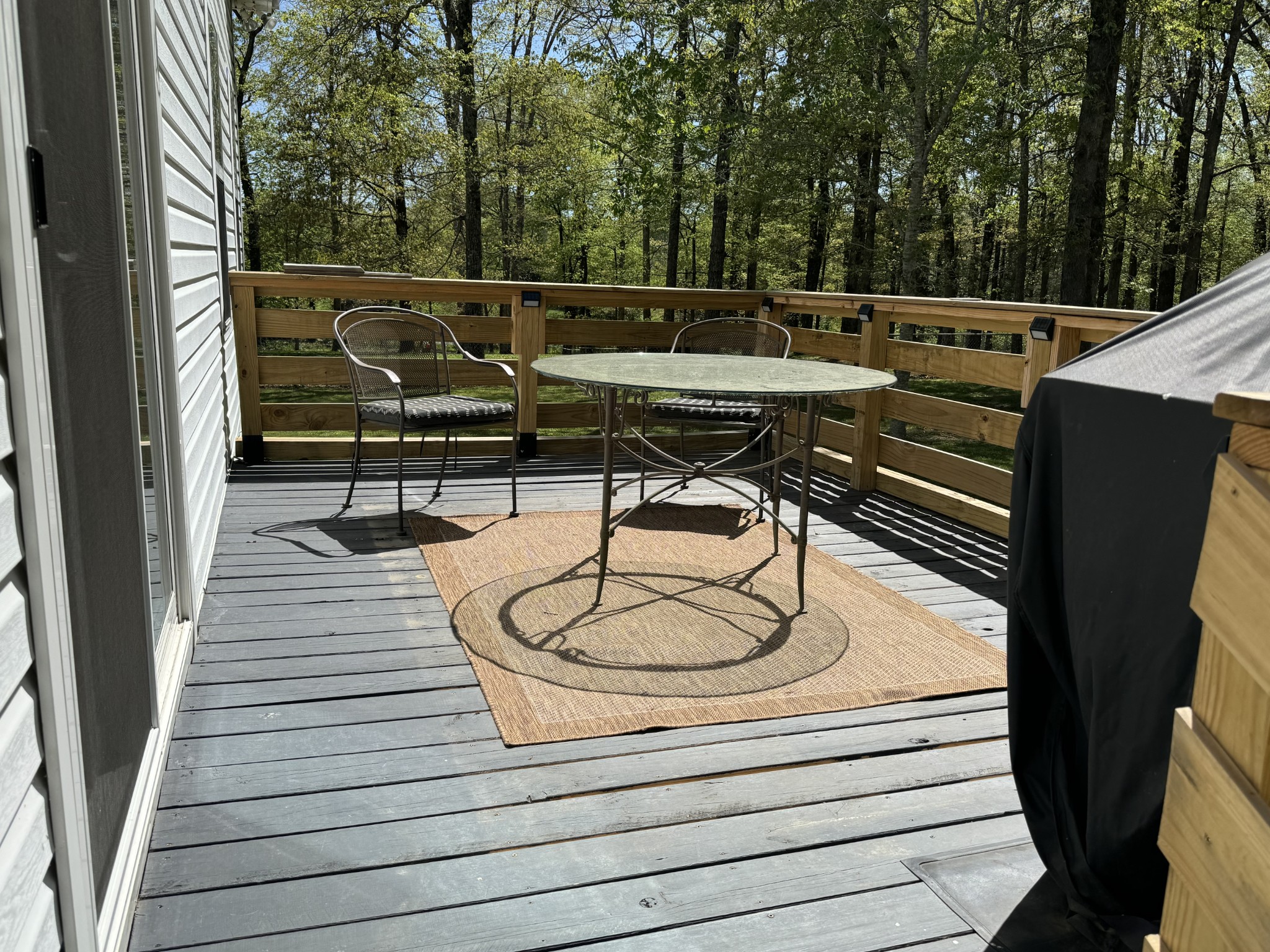 284 Baker Road Dickson, TN 37055 - Photo 11 of 36 a view of a roof deck with couches and wooden floor