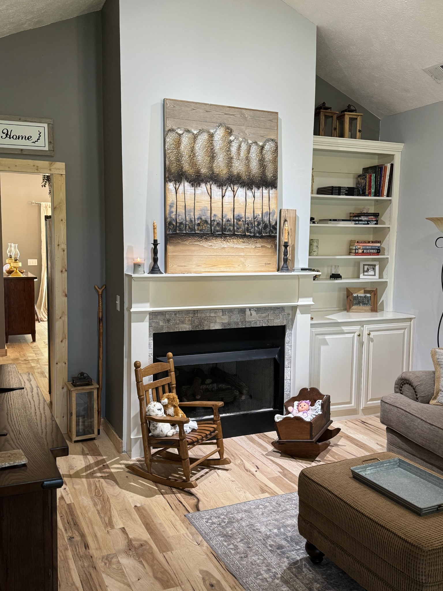 284 Baker Road Dickson, TN 37055 - Photo 19 of 36 a living room with furniture and a fireplace