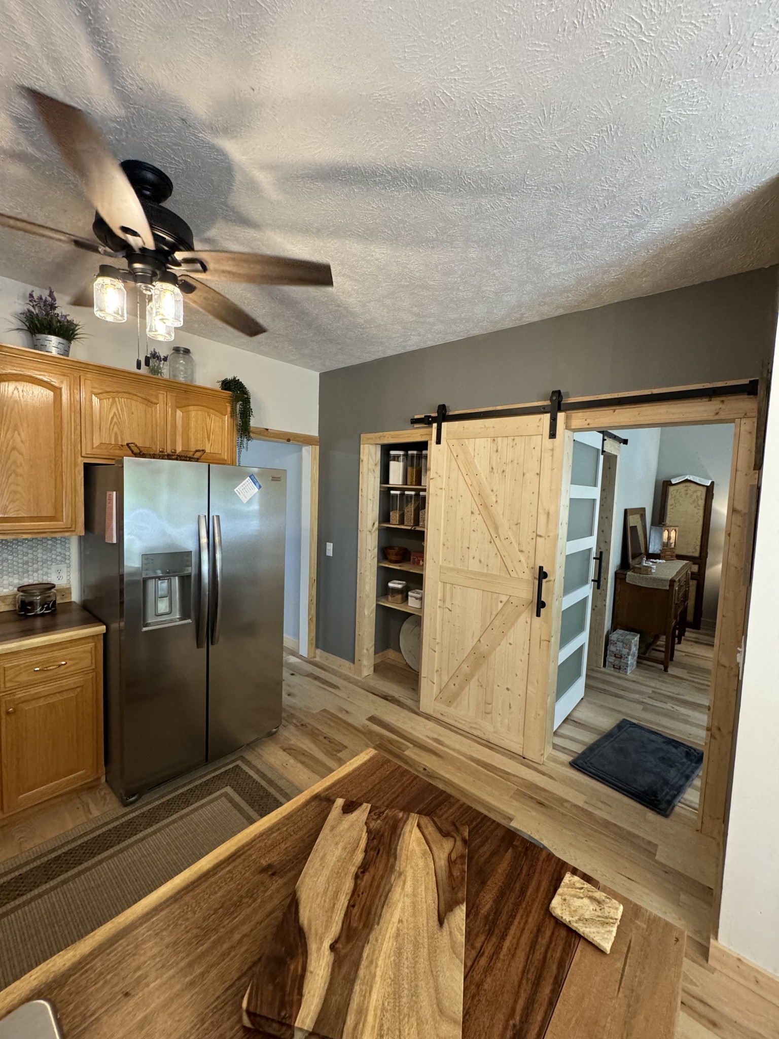 284 Baker Road Dickson, TN 37055 - Photo 26 of 36 a view of a living room with a flat screen tv