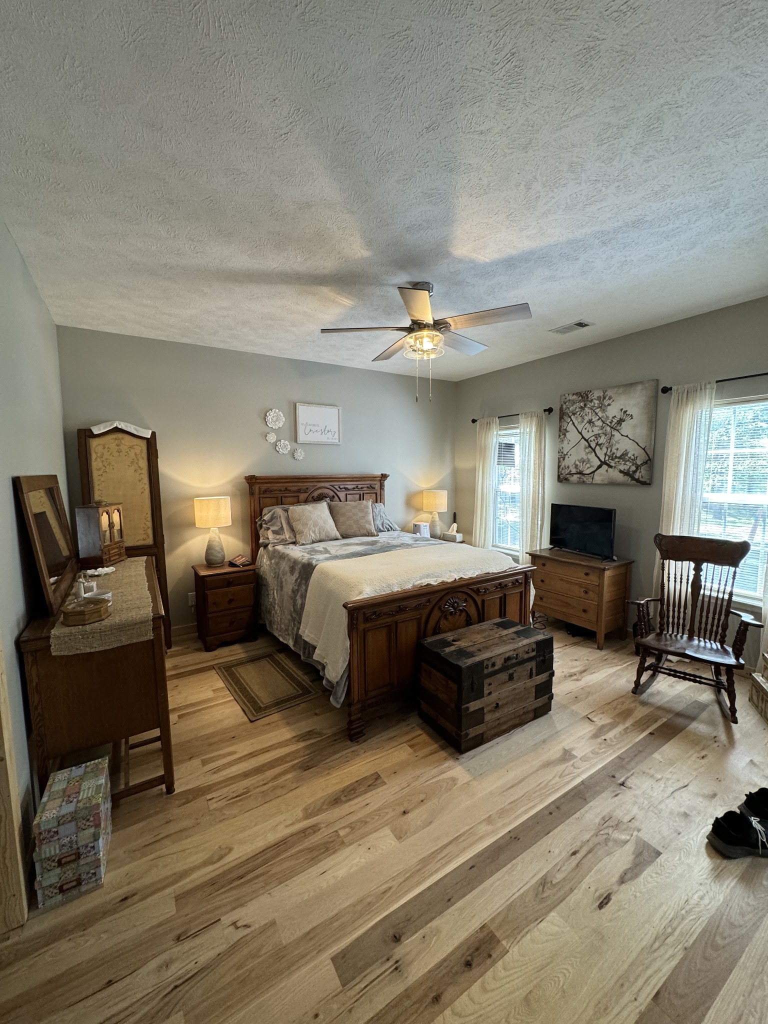 284 Baker Road Dickson, TN 37055 - Photo 30 of 36 a bedroom with furniture and a fireplace