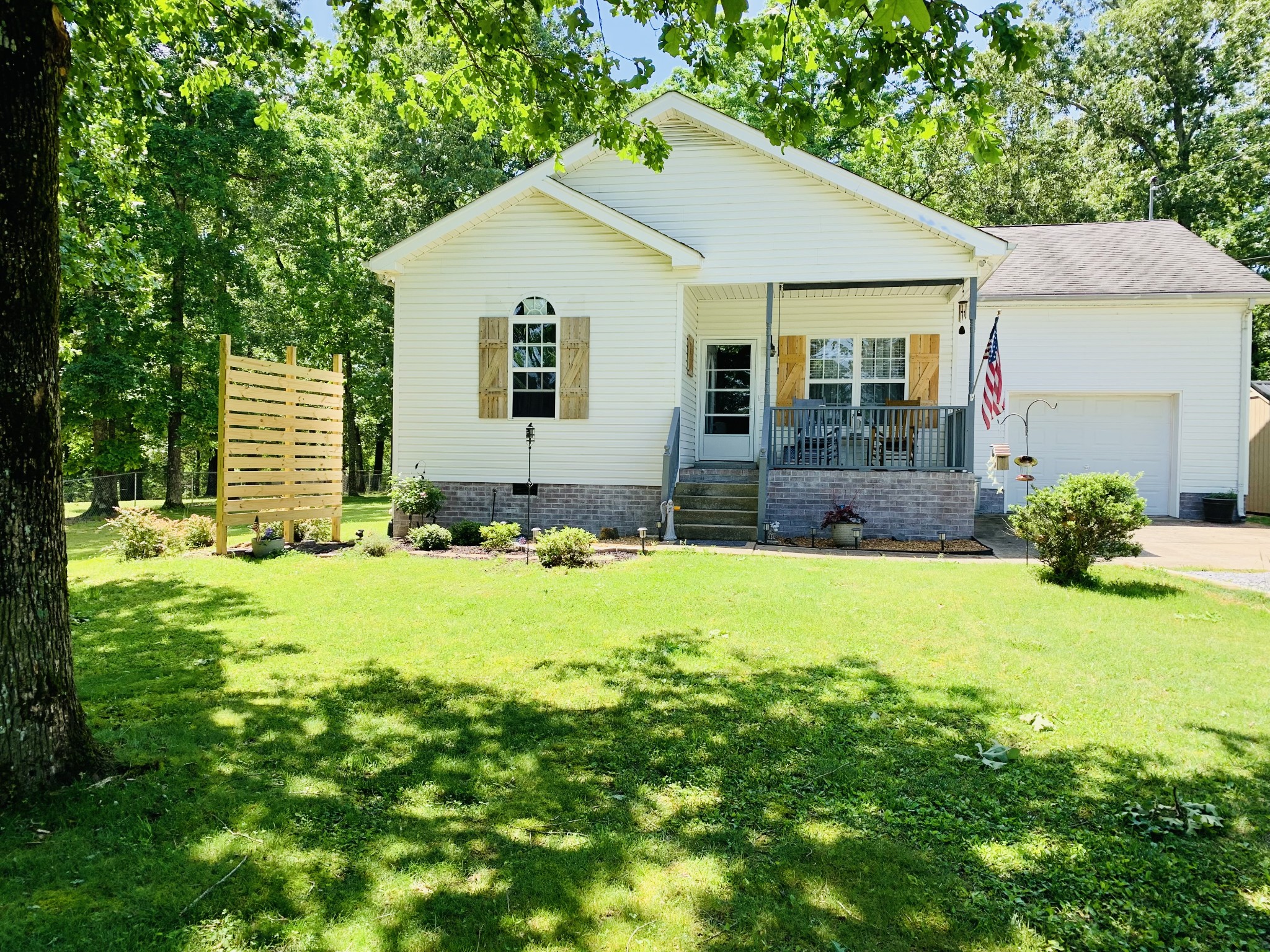 284 Baker Road Dickson, TN 37055 - Photo 3 of 36 a view of a house with a yard and plants