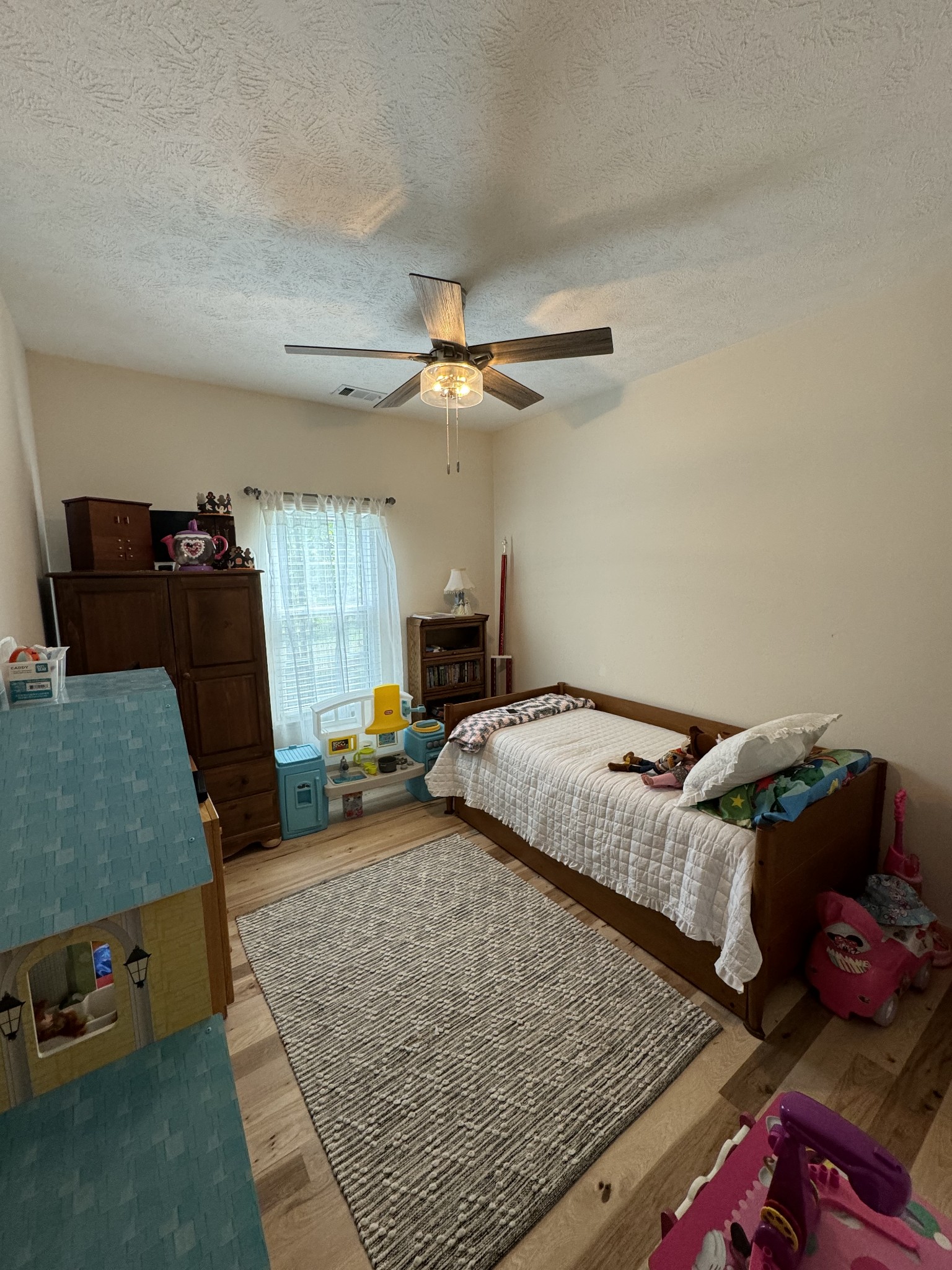 284 Baker Road Dickson, TN 37055 - Photo 32 of 36 a bedroom with furniture and a window