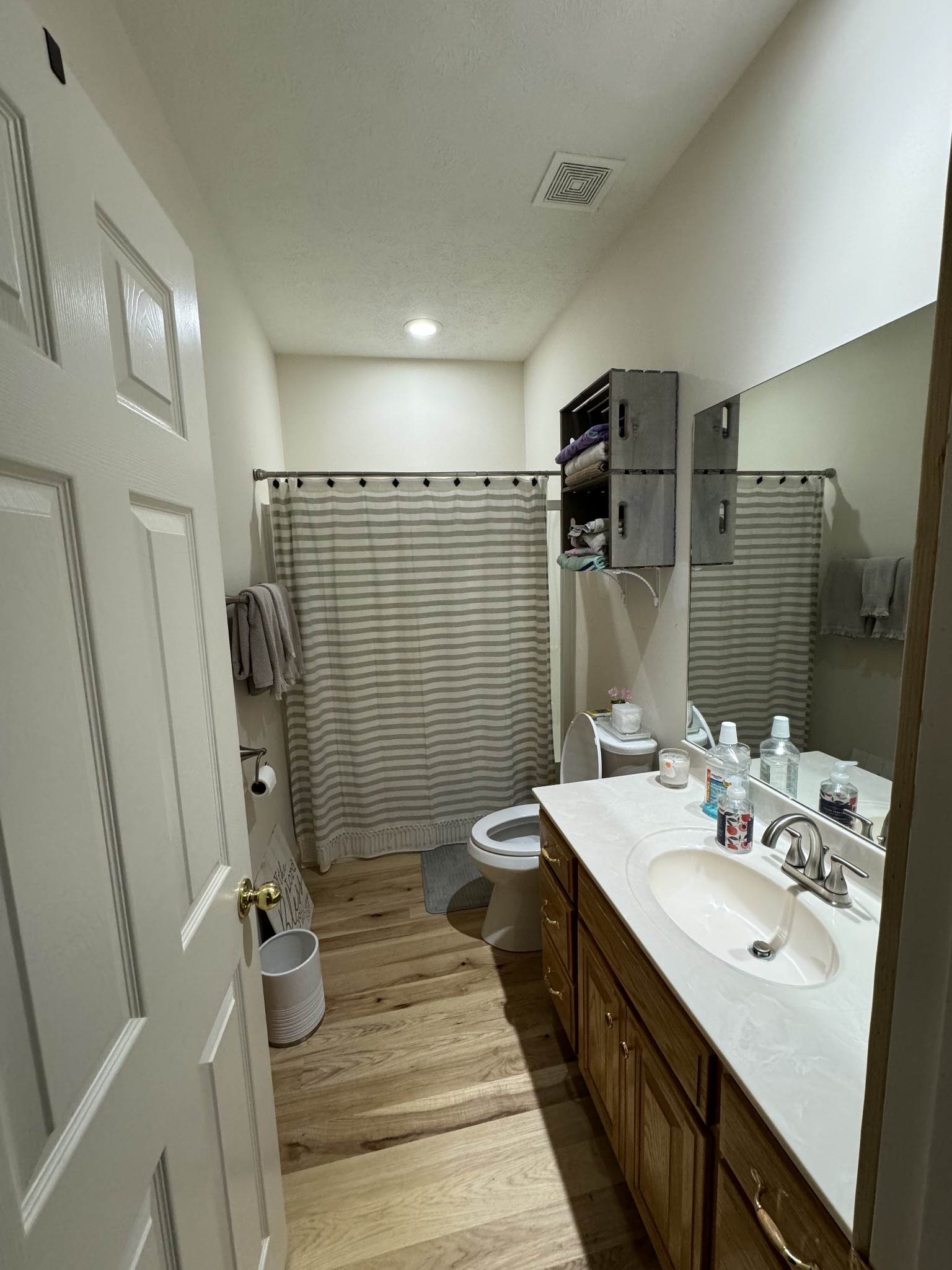 284 Baker Road Dickson, TN 37055 - Photo 35 of 36 a bathroom with a double vanity sink toilet and shower