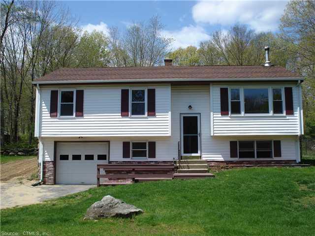40 Brooklyn Road Canterbury, CT 06331 - Photo 1 of 1 a front view of a house with a yard