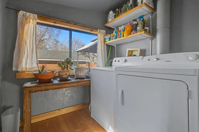 a view of washer and dryer sitting on a shelf