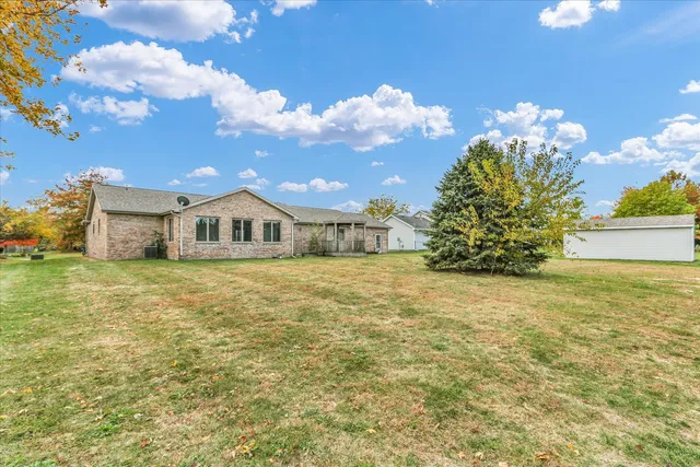 a view of house with a large windows