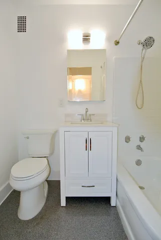 a kitchen with a sink stove and refrigerator