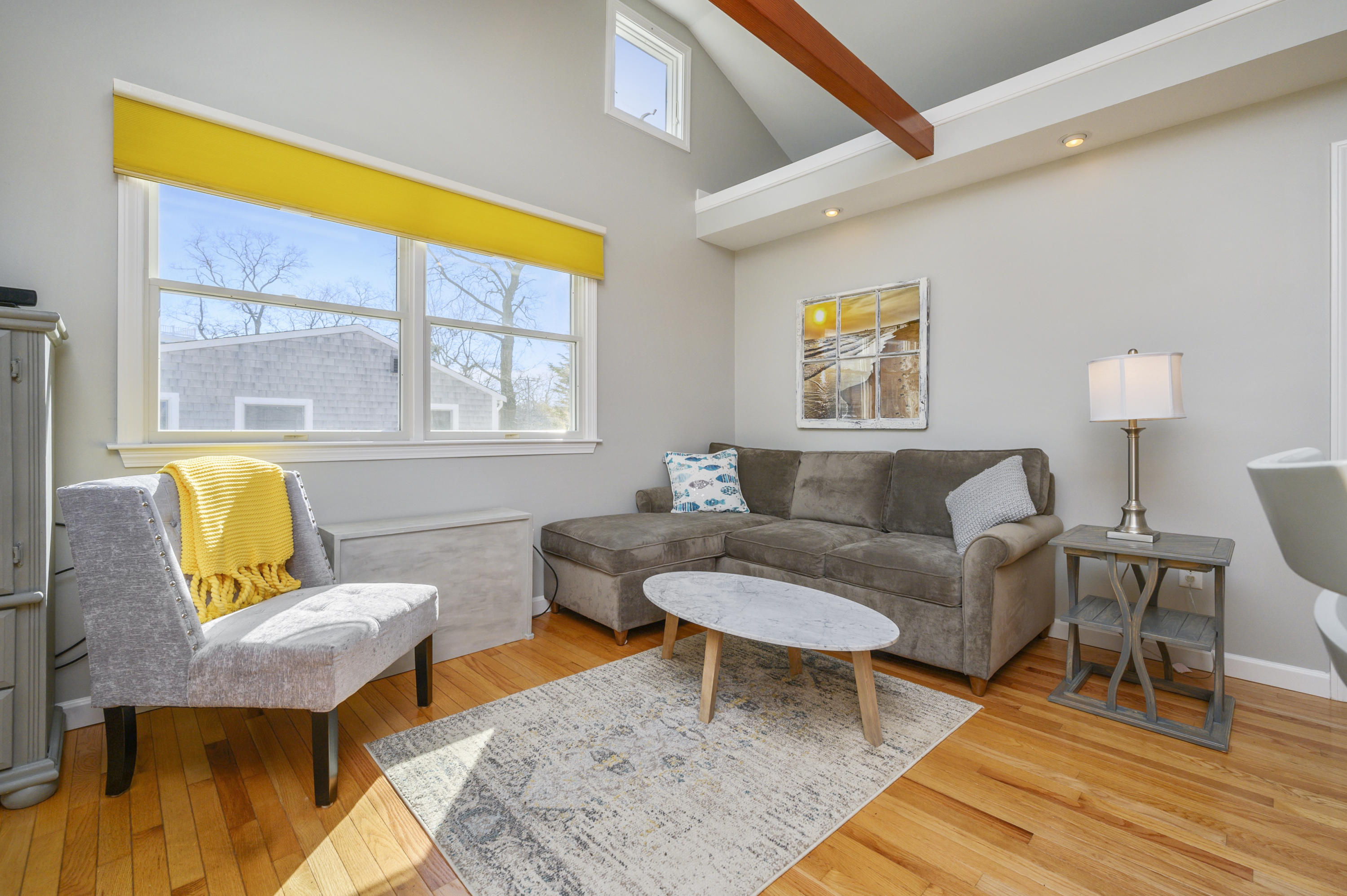 27 Locust Road, Unit 2 Eastham, MA 02642 - Photo 3 of 26 a living room with furniture and a table