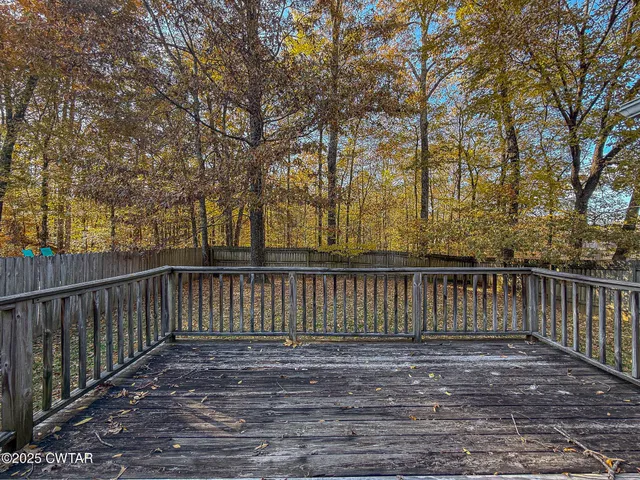 a view of a wooden fence