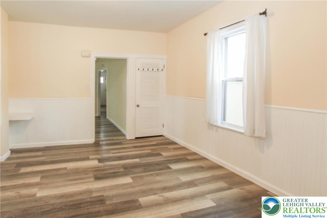 1522 Center Street, Unit 1 Bethlehem, PA 18018 - Photo 12 of 19 a view of a room with wooden floor and windows