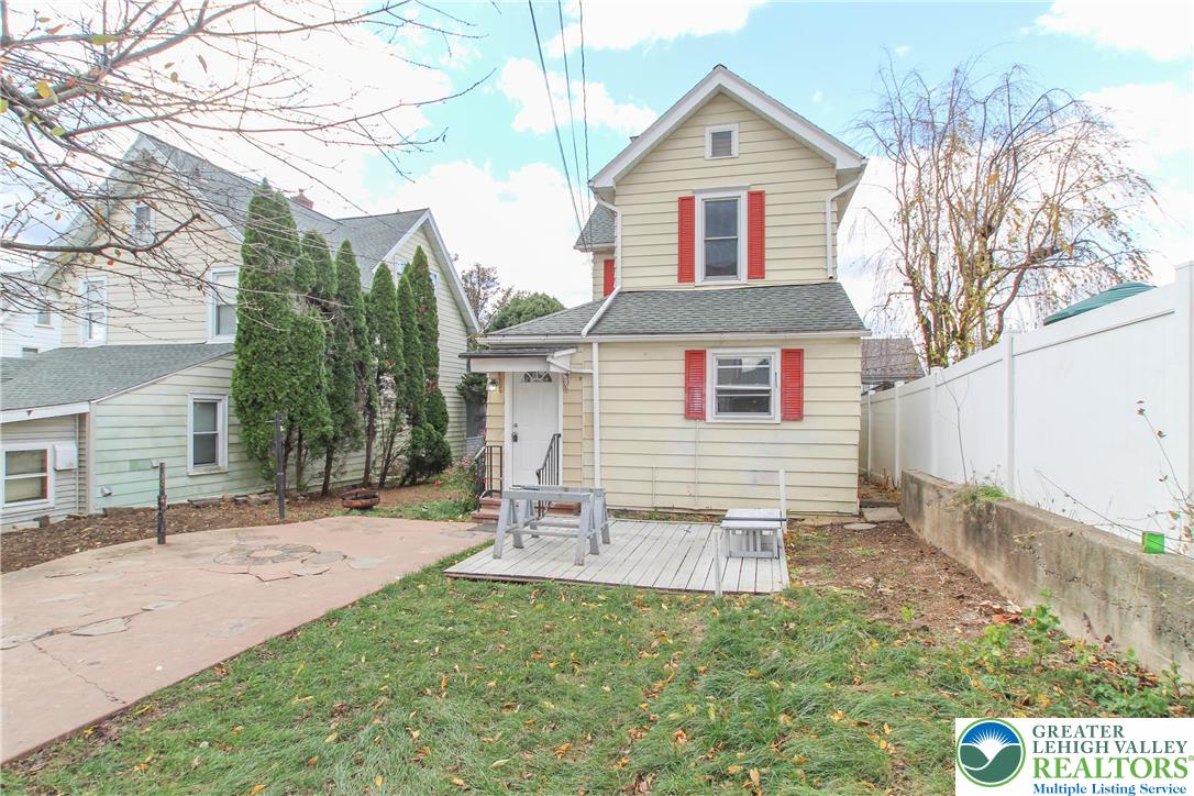1522 Center Street, Unit 1 Bethlehem, PA 18018 - Photo 6 of 19 a front view of a house with a yard