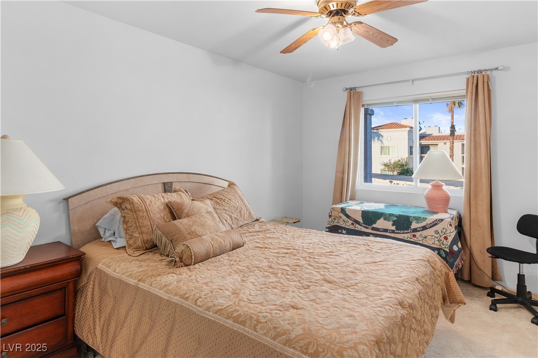 1928 Las Palmas Lane, Unit 228 Laughlin, NV 89029 - Photo 18 of 77 Carpeted Secondary bedroom with a ceiling fan
