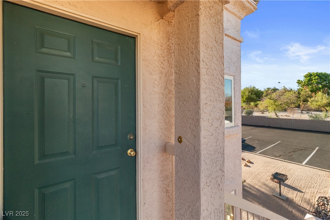 1928 Las Palmas Lane, Unit 228 Laughlin, NV 89029 - Photo 5 of 77 View of exterior entry featuring stucco siding