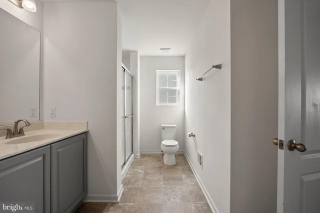 a bathroom with a sink and a toilet