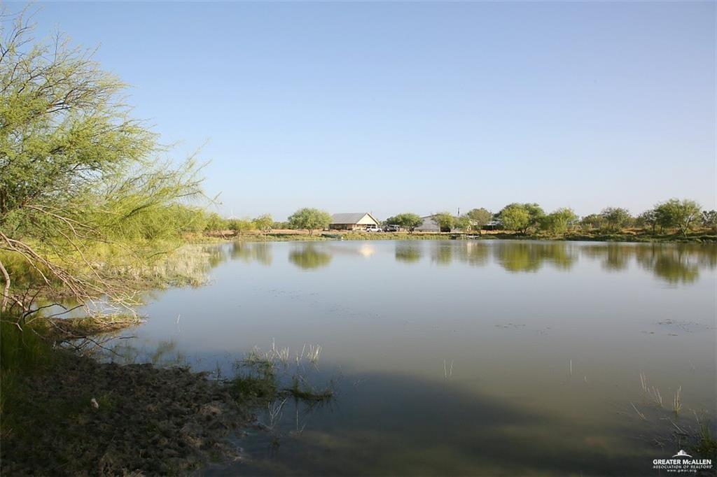 0 Loma Blanca Road Roma, TX 78584 - Photo 19 of 34 a view of a lake view with houses in back