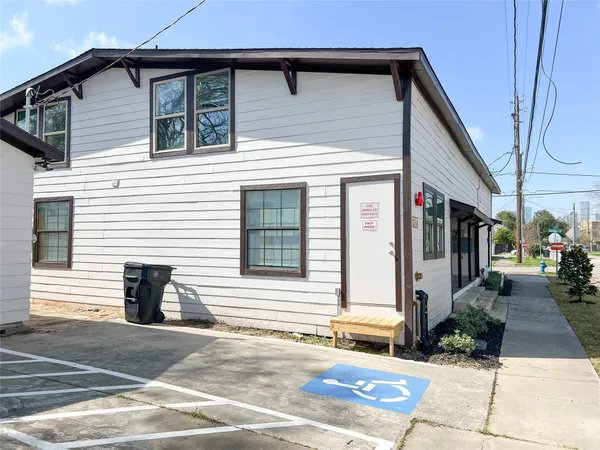 a view of a house with a street
