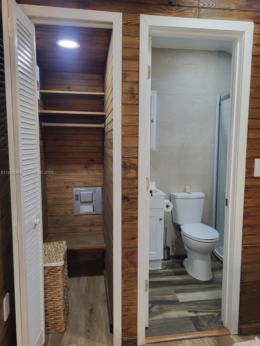 2137 Northwest 97th Street, Unit 2137 Miami, FL 33147 - Photo 14 of 19 a bathroom with a toilet and a shower