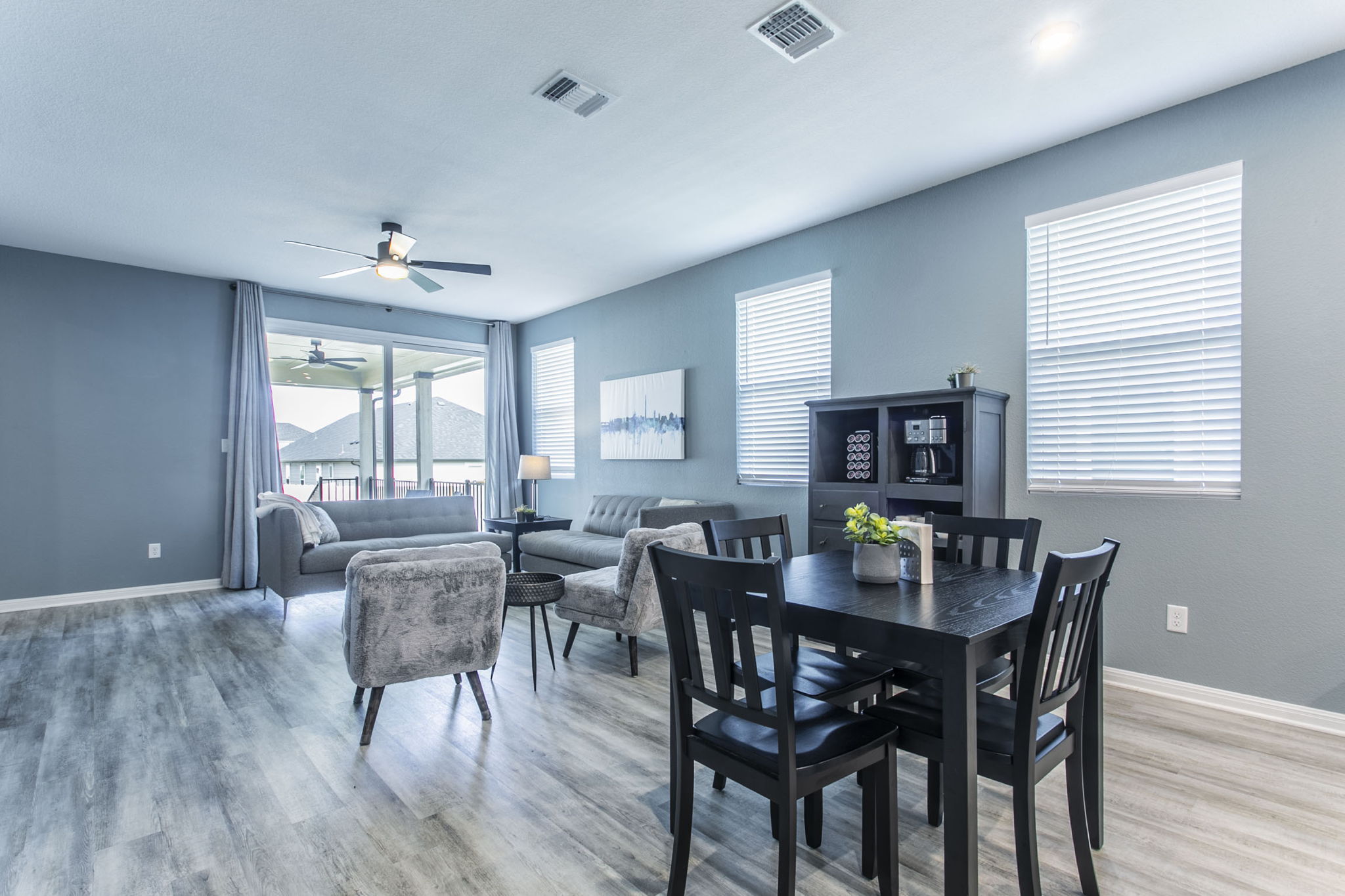 228 Citation Drive Jarrell, TX 76537 - Photo 18 of 30 Dining space featuring a ceiling fan, light wood-type flooring, and baseboards